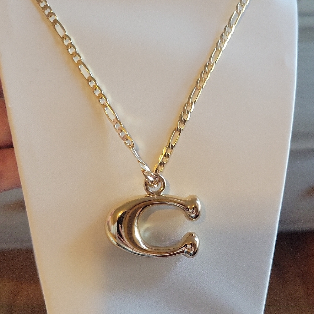COACH Gold Charm